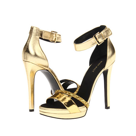 Nine West 玖熙 新款女士超细高跟凉鞋 Firstmet (金色/黑色)，原价￥1978，限时仅售￥968！绝对正品，超低折扣，含美国直邮～